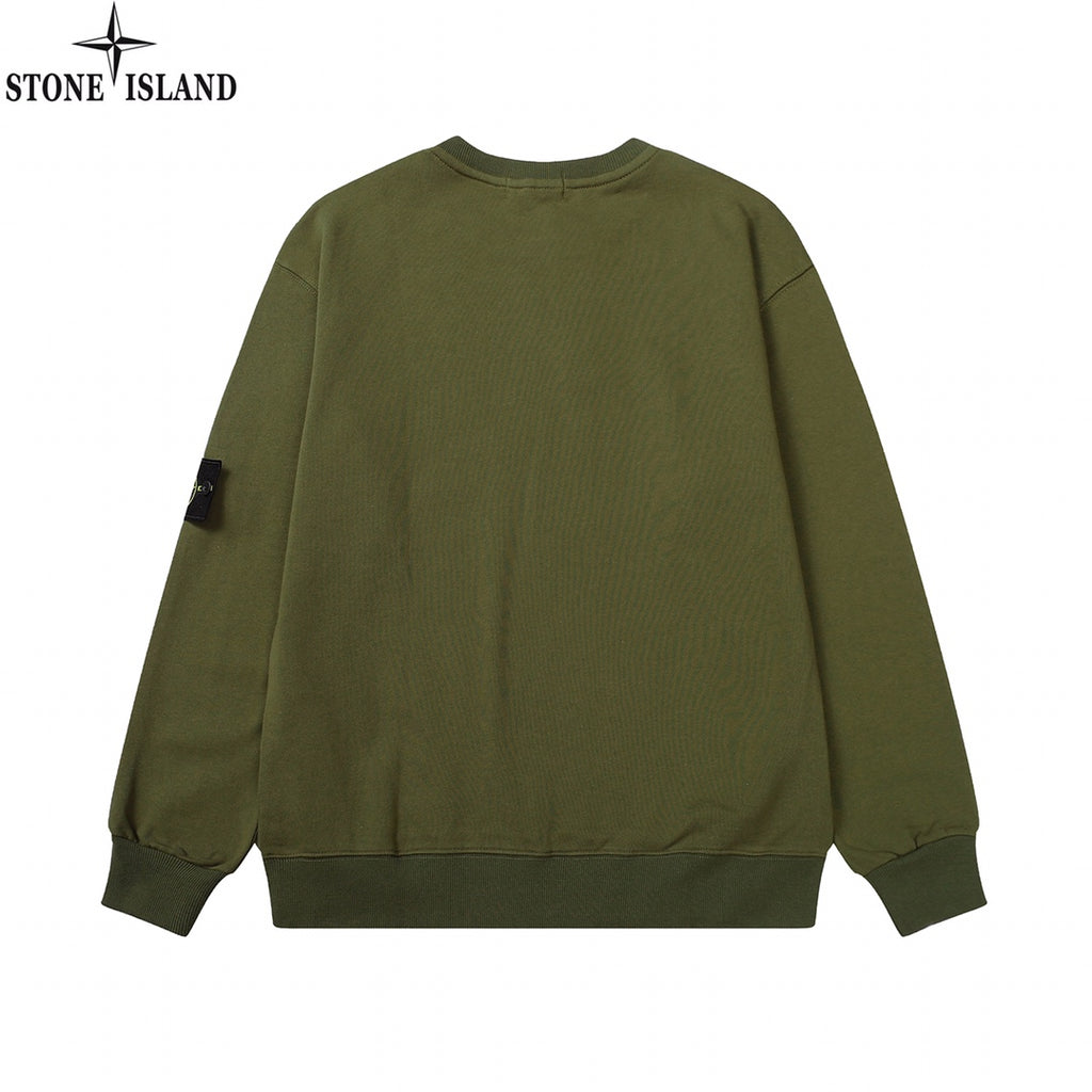 Olive green crewneck sweatshirt with ribbed hem and small side patch