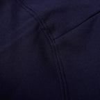 Navy sweatshirt close-up of front seam with subtle stitch detail