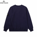 Navy crewneck sweatshirt, back view with ribbed cuffs and hem