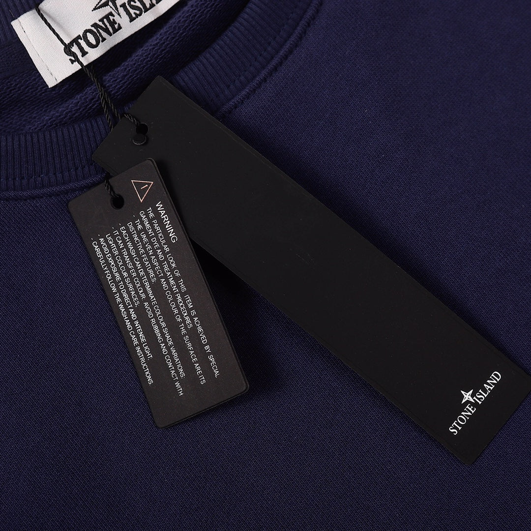 Navy sweatshirt with interior label tags and stitched neck binding