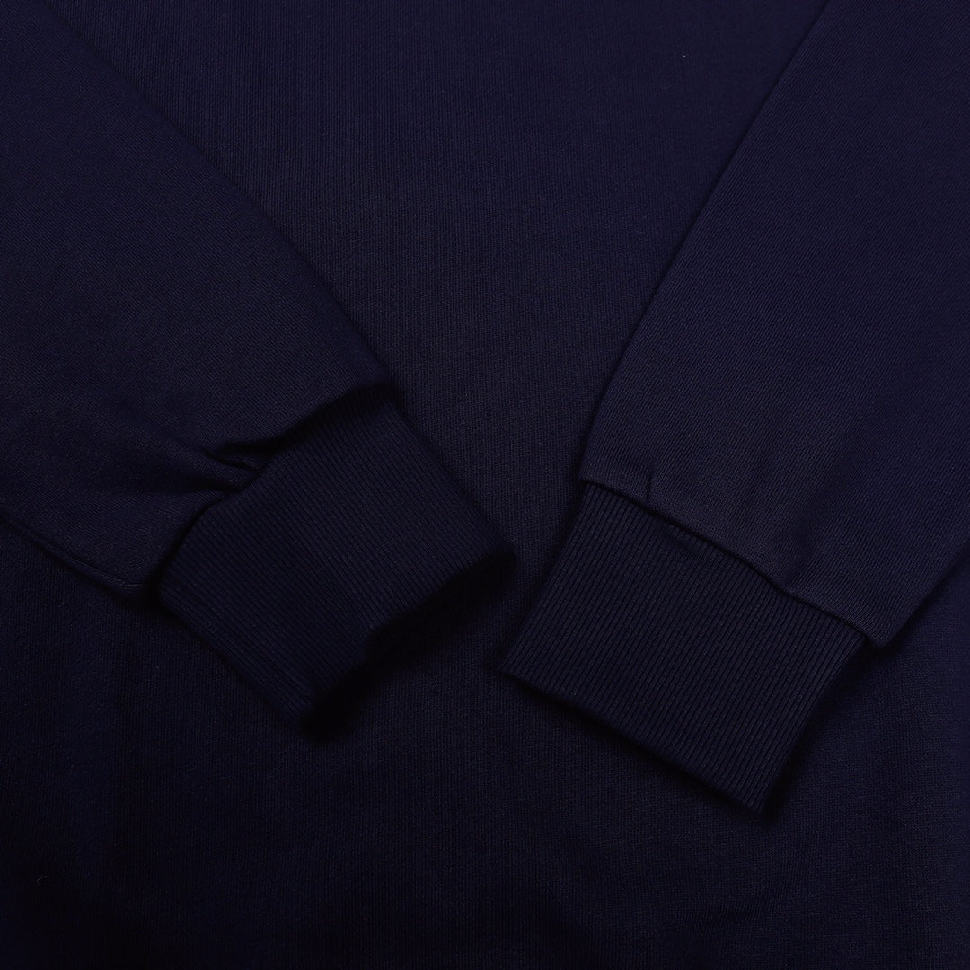 Navy crewneck sweatshirt sleeve cuff and neckline seam detail