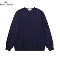 Navy crewneck sweatshirt with long sleeves and ribbed cuffs and hem