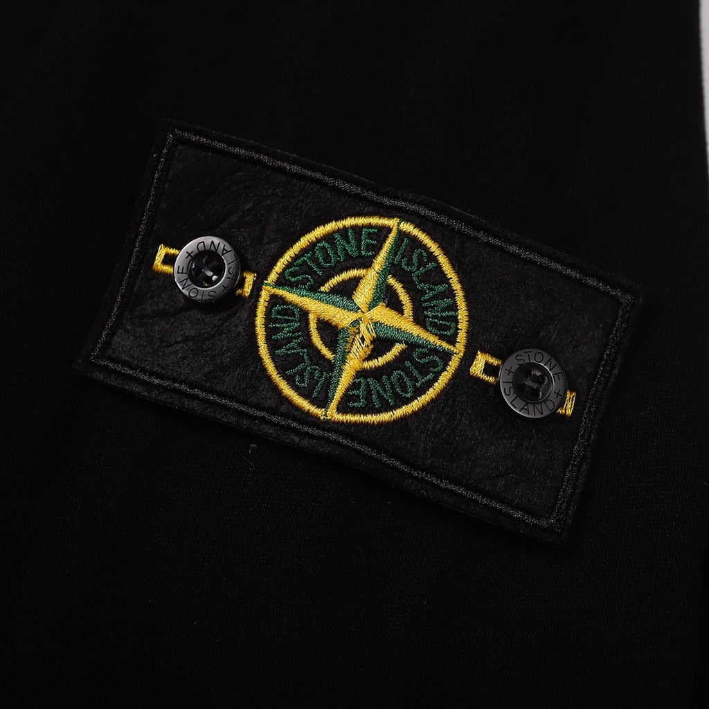 Black crewneck sweatshirt embroidered logo patch on chest
