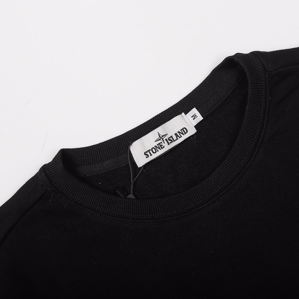 Black crewneck sweatshirt neck label and crew collar