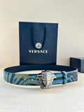 Versace belt with blue and teal patterned strap and silver Medusa buckle