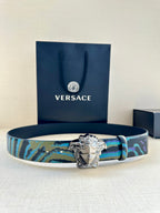 Versace belt with blue and teal patterned strap and silver Medusa buckle