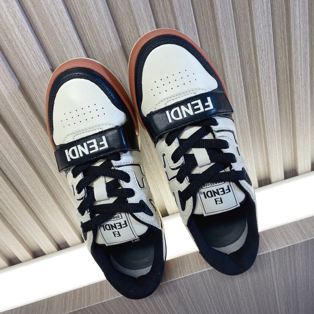 Fendi unisex sneakers in white and black with tan sole, lace-up design