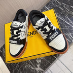 Fendi unisex sneakers with black laces, white uppers and Fendi branding on strap