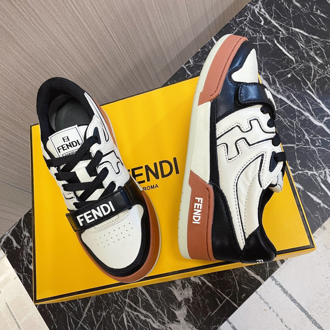 Fendi unisex sneakers in white and black with tan side trim and lace-up closure