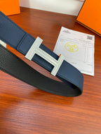 Navy leather belt with large square H buckle on center strap