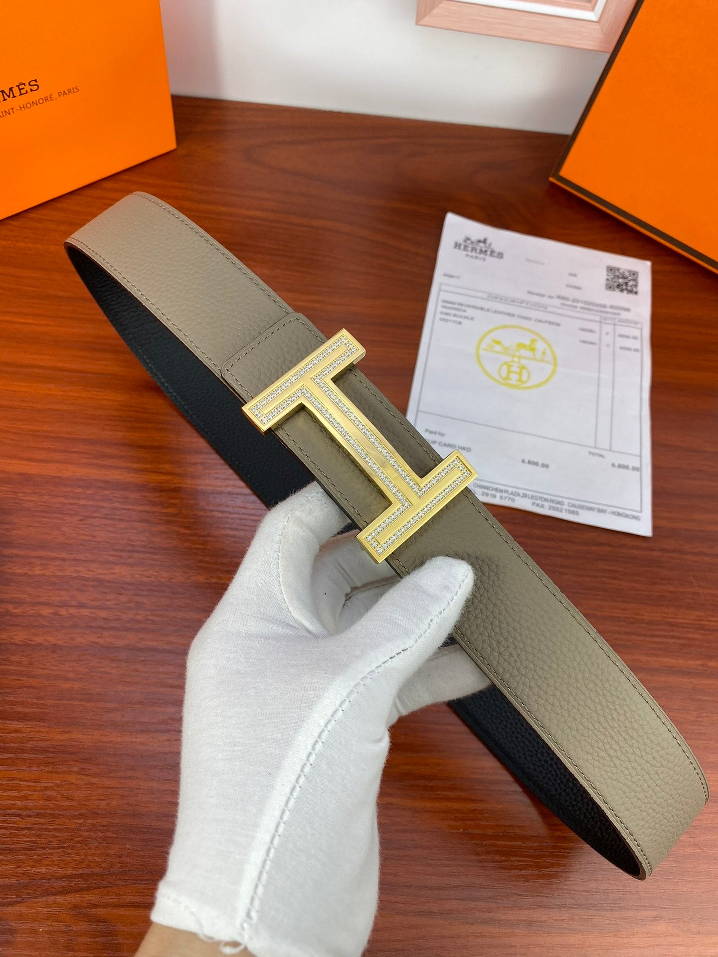 Hermes reversible belt with dark strap and light olive strap, silver H buckle detail