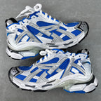 Unisex sneakers in white, blue, and silver with lace-up and textured panels