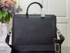 Men's Louis Vuitton briefcase with top handle and front strap buckle
