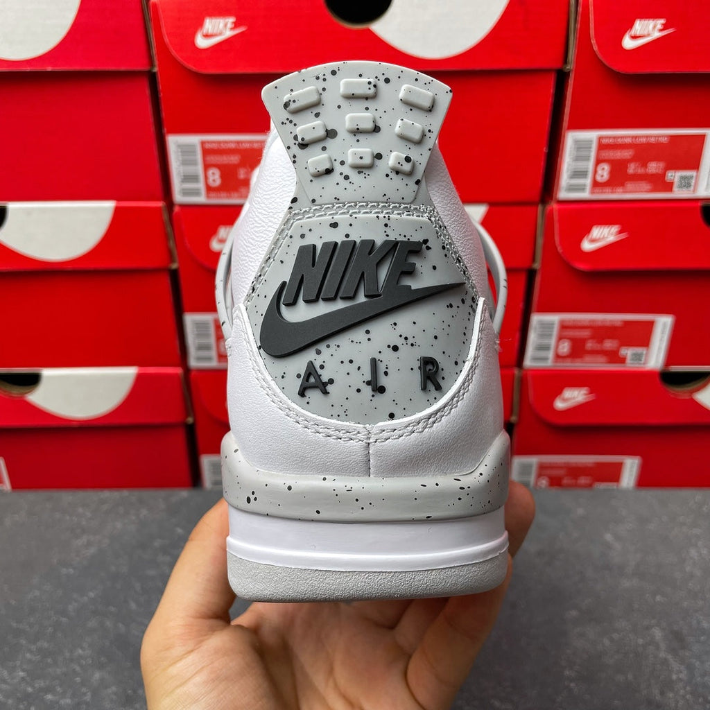 White high-top sneaker heel with gray NIKE AIR branding and speckled detail