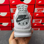 White high-top sneaker heel with gray NIKE AIR branding and speckled detail
