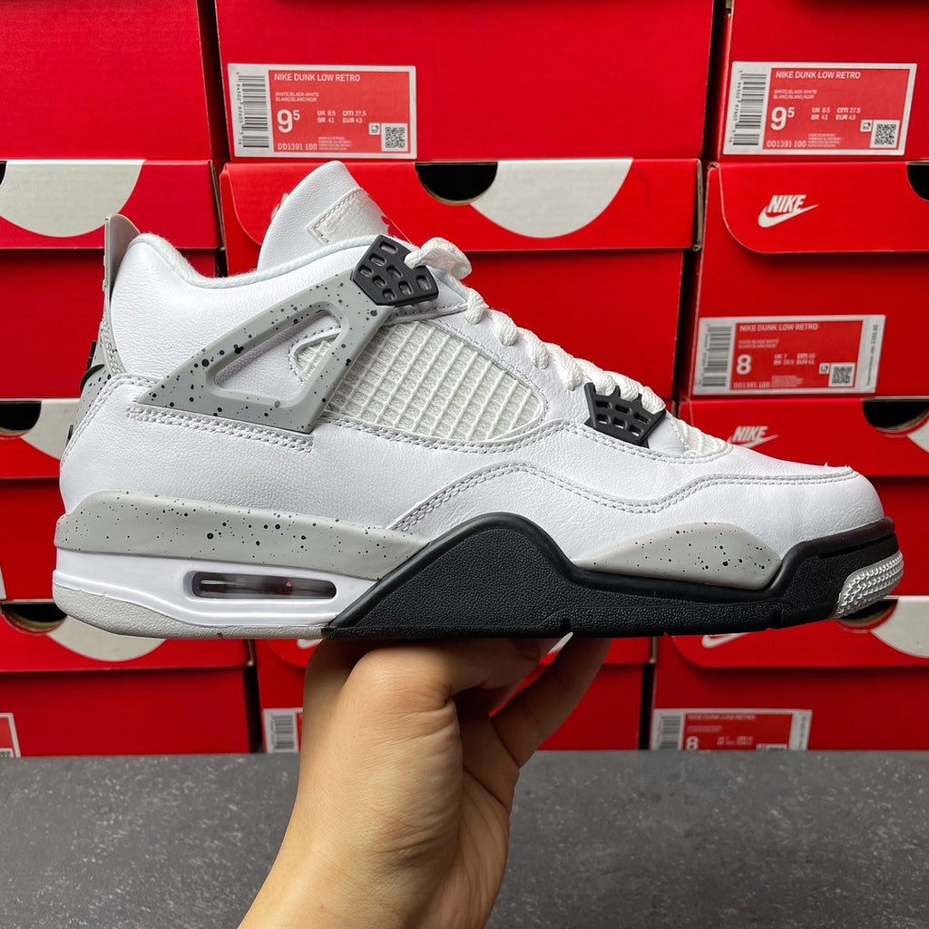 White and black high-top sneaker with mesh side panel and black heel tab