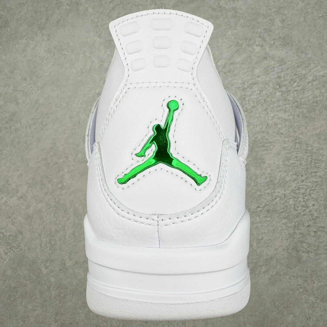 White sneaker heel close-up with green Jumpman logo patch