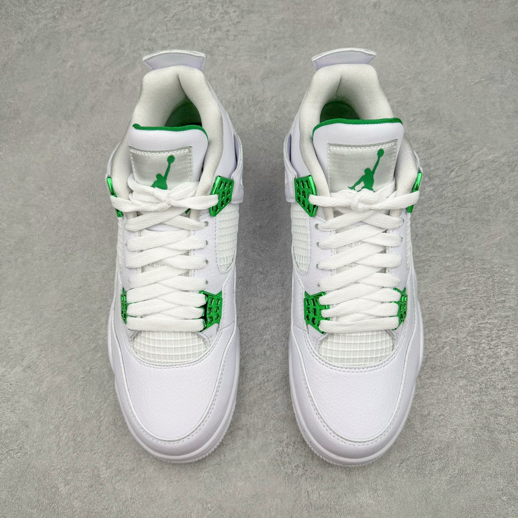 White low-top sneaker pair with green Jumpman logo and patterned ankle straps