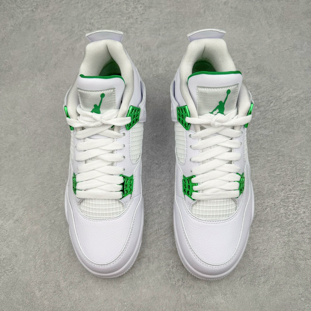 White low-top sneaker pair with green Jumpman logo and patterned ankle straps
