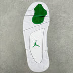 White outsole view with green traction pods and Jumpman logo on the heel