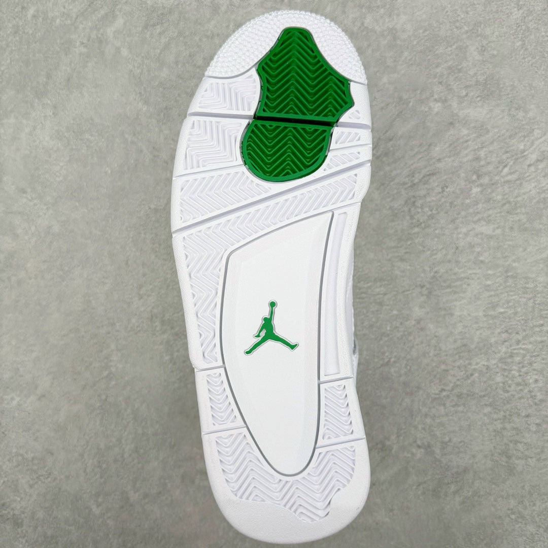 White outsole view with green traction pods and Jumpman logo on the heel