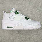 White low-top sneaker with green lace accents and Air sole window