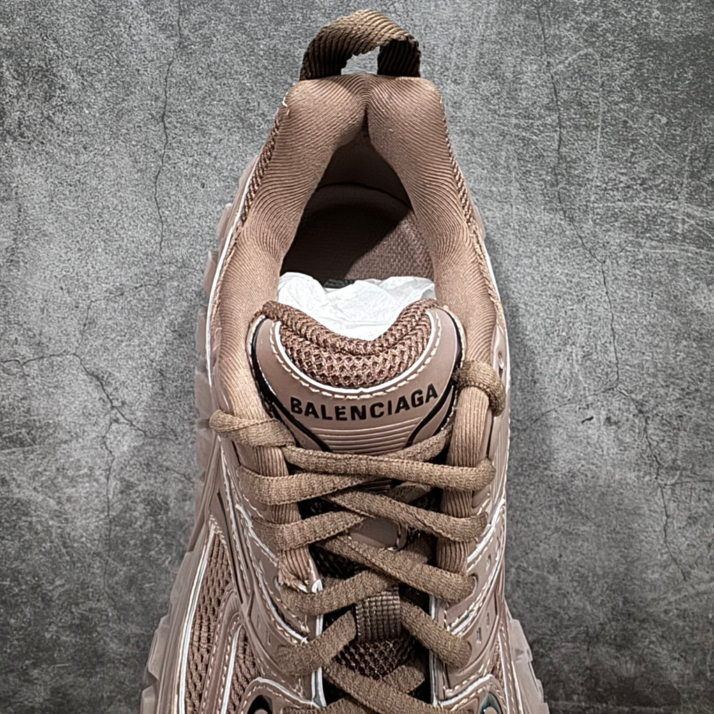 Unisex sneakers heel view with BALENCIAGA logo on sock collar, beige knit lining