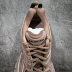 Unisex sneakers heel view with BALENCIAGA logo on sock collar, beige knit lining
