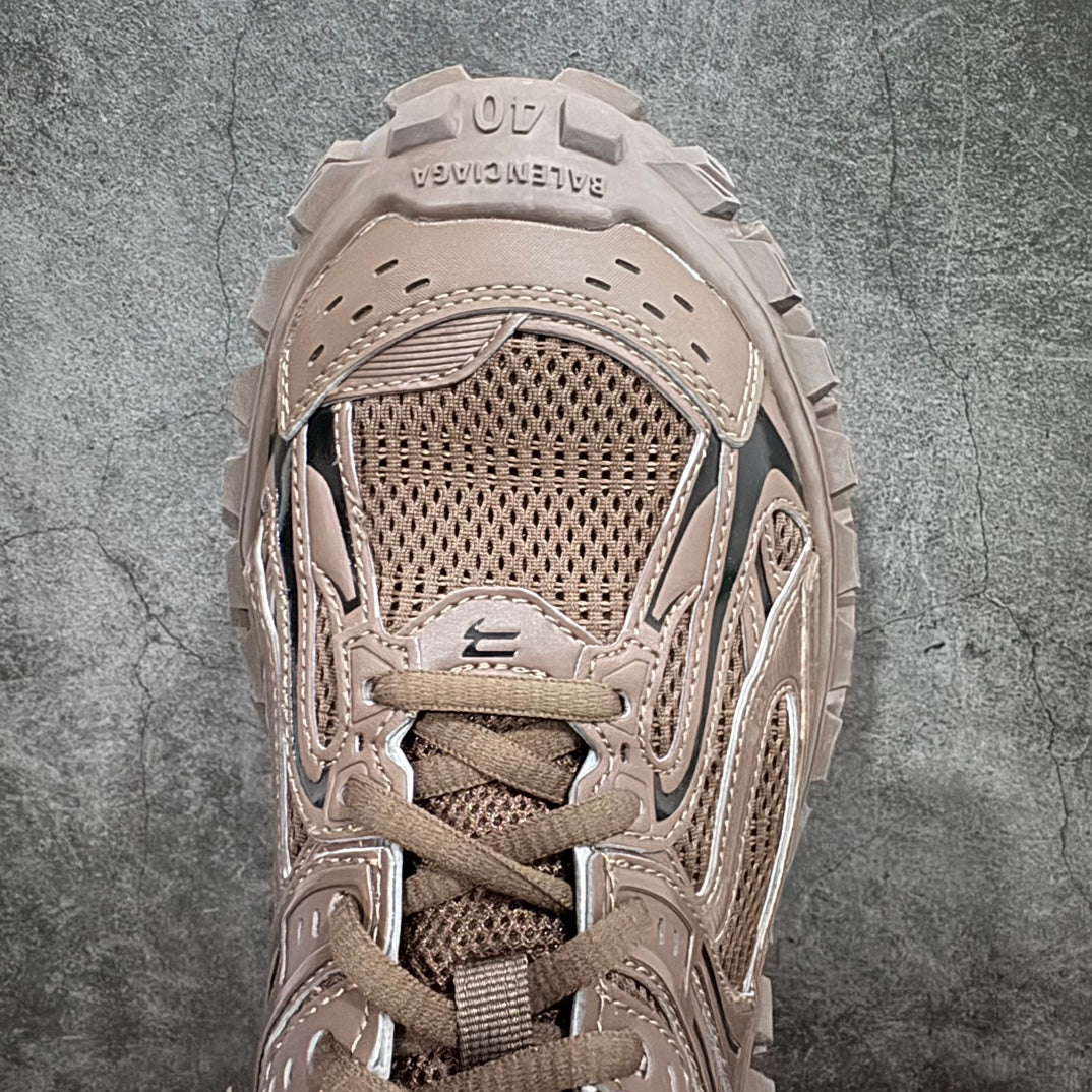 Unisex sneakers toe view with textured mesh, stitched panels, and lace-up closure