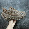 Unisex chunky sneakers with beige mesh upper, striped overlays, and grippy lug sole