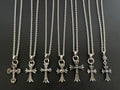 Silver-tone cross pendant necklaces on chain, assorted designs