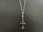 Silver-tone cross pendant necklace with open loop clasp and flared cross arms
