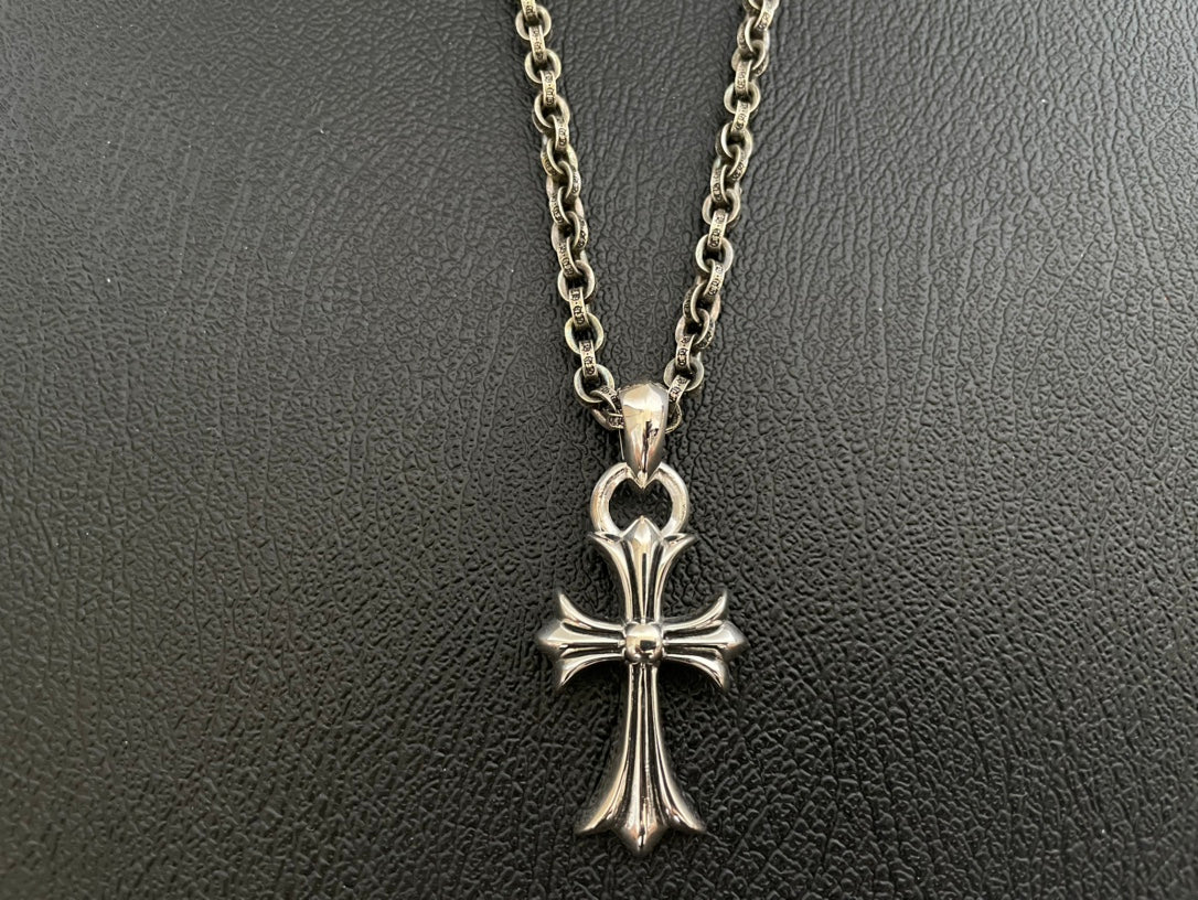 Chrome-tone chain necklace with cross pendant charm