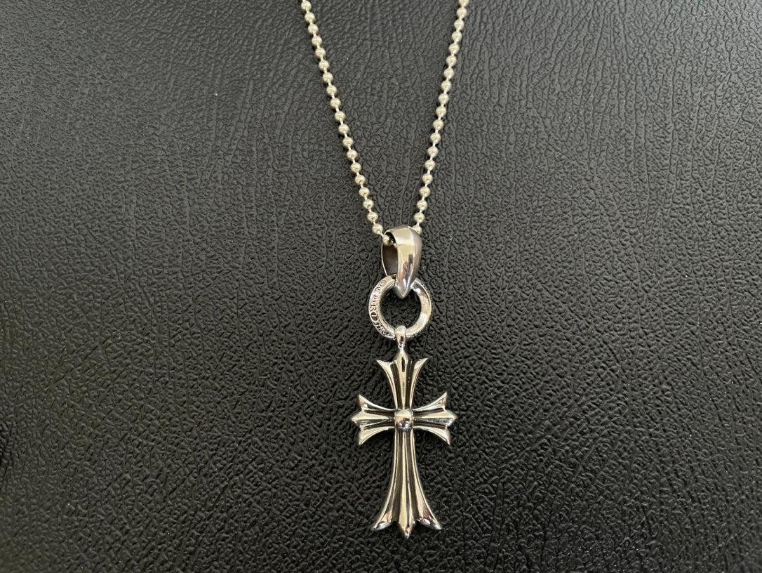 Chrome-tone chain necklace with cross pendant charm