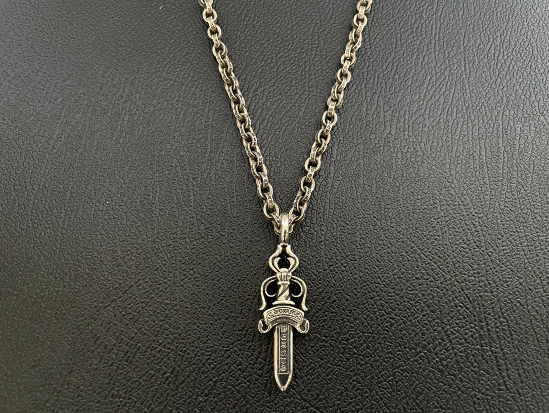 Chrome-tone chain necklace with sword-shaped dagger charm