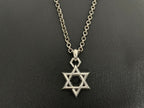 Silver-tone Star of David charm necklace with small loop bail on double chain.