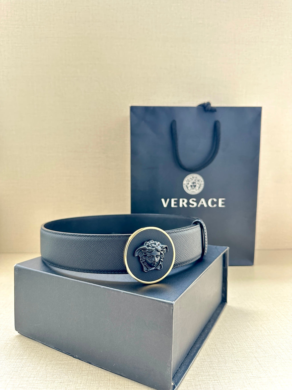 Versace dark blue leather belt with round Medusa buckle on smooth band