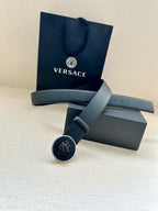Versace dark blue leather belt with round Medusa buckle and overlapping strap ends