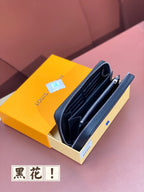 Louis Vuitton monogram zip wallet, open with card slots, dark blue