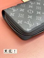 Louis Vuitton monogram small pouch bag in dark blue with silver-tone zipper and stitched edge
