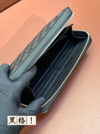 Louis Vuitton small bag, dark blue with stitched edge and zipped inner compartments