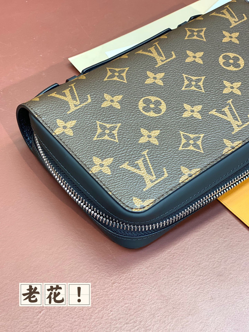 Louis Vuitton small zip bag with blue monogram canvas and rounded zipper edge
