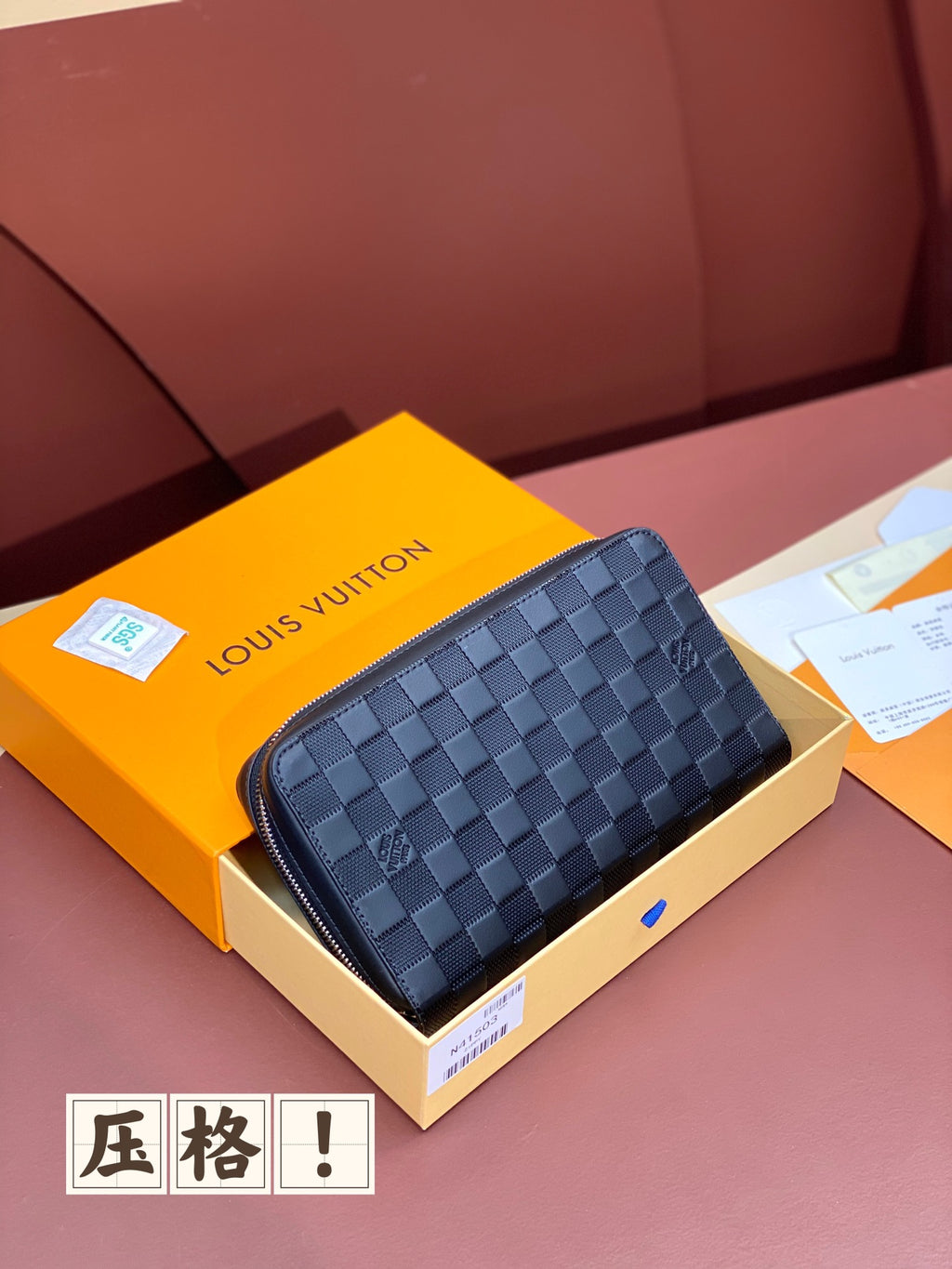Louis Vuitton small zip pouch bag in blue checkered leather, angled front view.