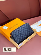 Louis Vuitton small zip pouch bag in blue checkered leather, angled front view.