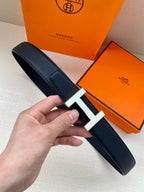 Hermes belt in dark textured leather with silver H buckle and pin closure