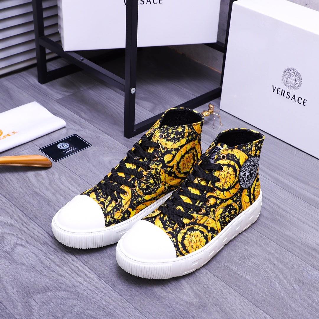High-top sneakers in yellow-and-black floral print, side view with white sole