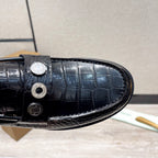 Burberry luxury loafers, black embossed leather vamp with metal stud closure