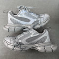 Balenciaga mesh sneakers with light gray-blue uppers, lace-up, chunky rubber sole
