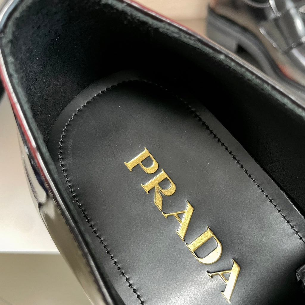 Prada insole detail, black leather insole with gold “PRADA” lettering