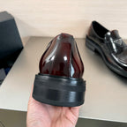 Prada unisex loafer, burgundy-red glossy leather upper with thick dark rubber sole